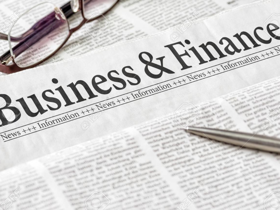 A newspaper with the headline Business and Finance